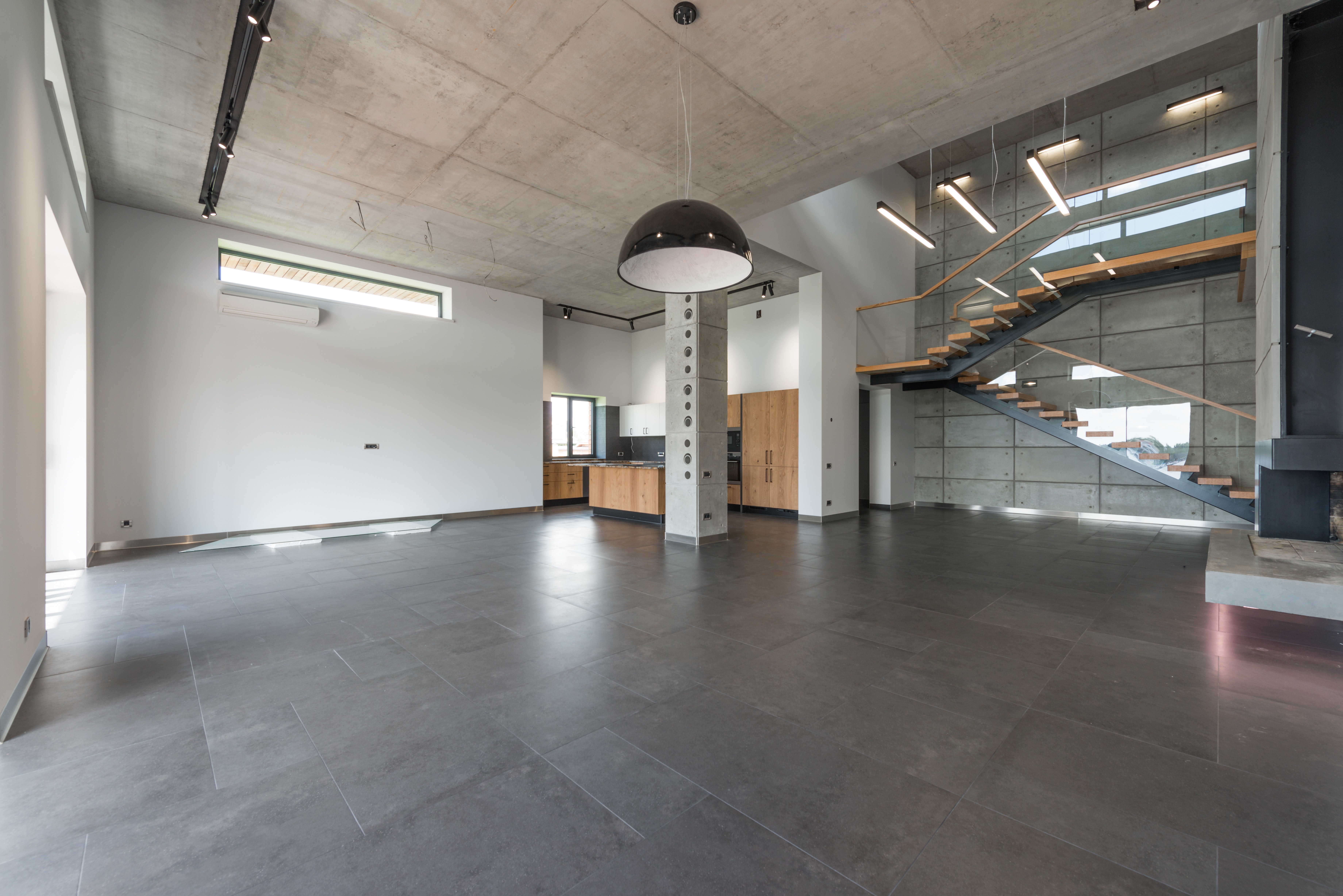 Fireplace + Staircase feature wall with concrete cladding