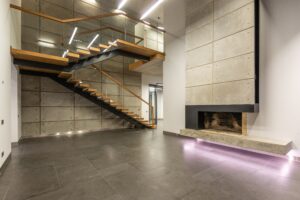 Concrete panels on staircase and Fireplace.